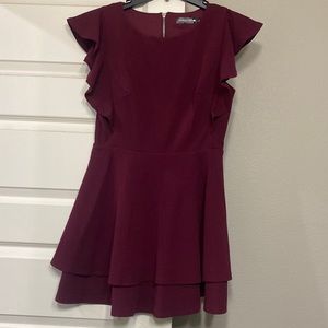 Burgundy dress with zipper detail and flutter sleeves. only worn once!